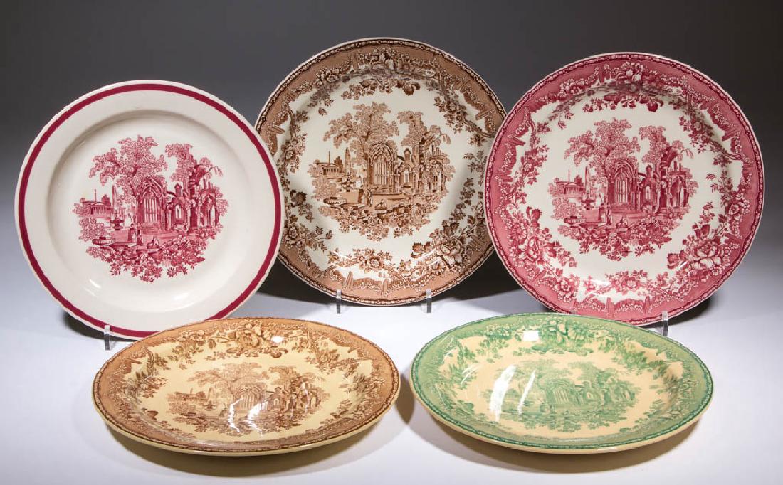 BUFFALO CHINA NEW YORK CENTRAL RAILROAD CERAMIC PLATES,: BUFFALO CHINA NEW YORK CENTRAL RAILROAD CERAMIC PLATES, LOT OF FIVE, in five color and edge variations, having a romantic scene with ruins and floral border, Altman refers to the design as "Country Ga