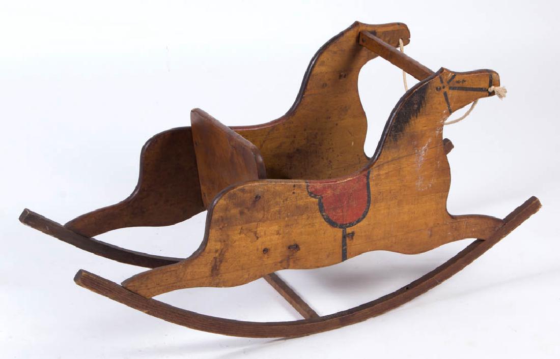 CARVED AND PAINTED POPLAR ROCKING HORSE (1 of 2)