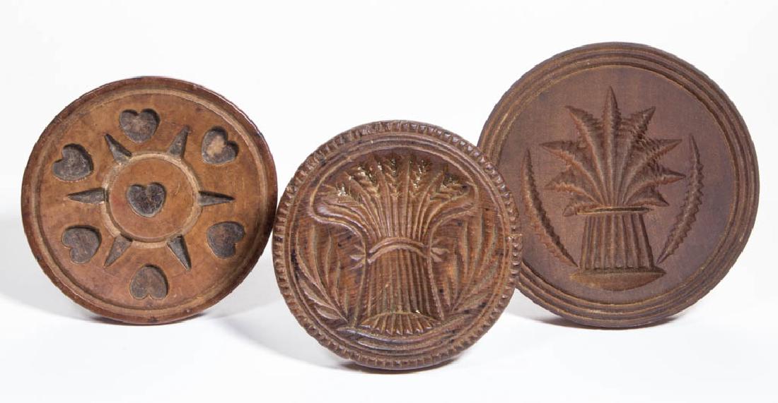 CARVED TREEN BUTTER PRINTS, LOT OF THREE (1 of 2)