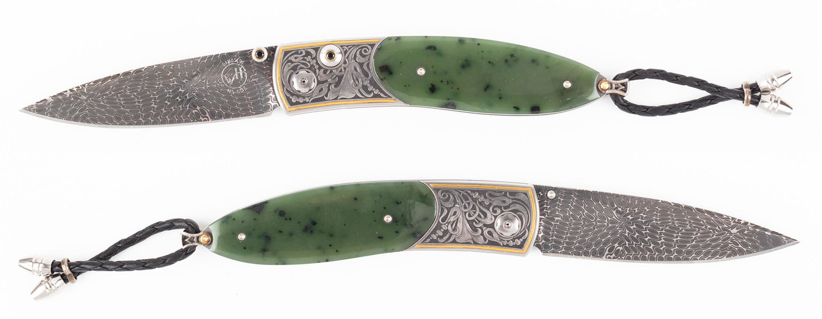 William Henry Knife: Striking Sterling Silver with: William Henry Knife: Striking Sterling Silver with Inlaid Gold Handle Inset with Green Jade and Hand Forged Damascus Steel Blade. William Henry luxury folding knives are admired and collected the worl