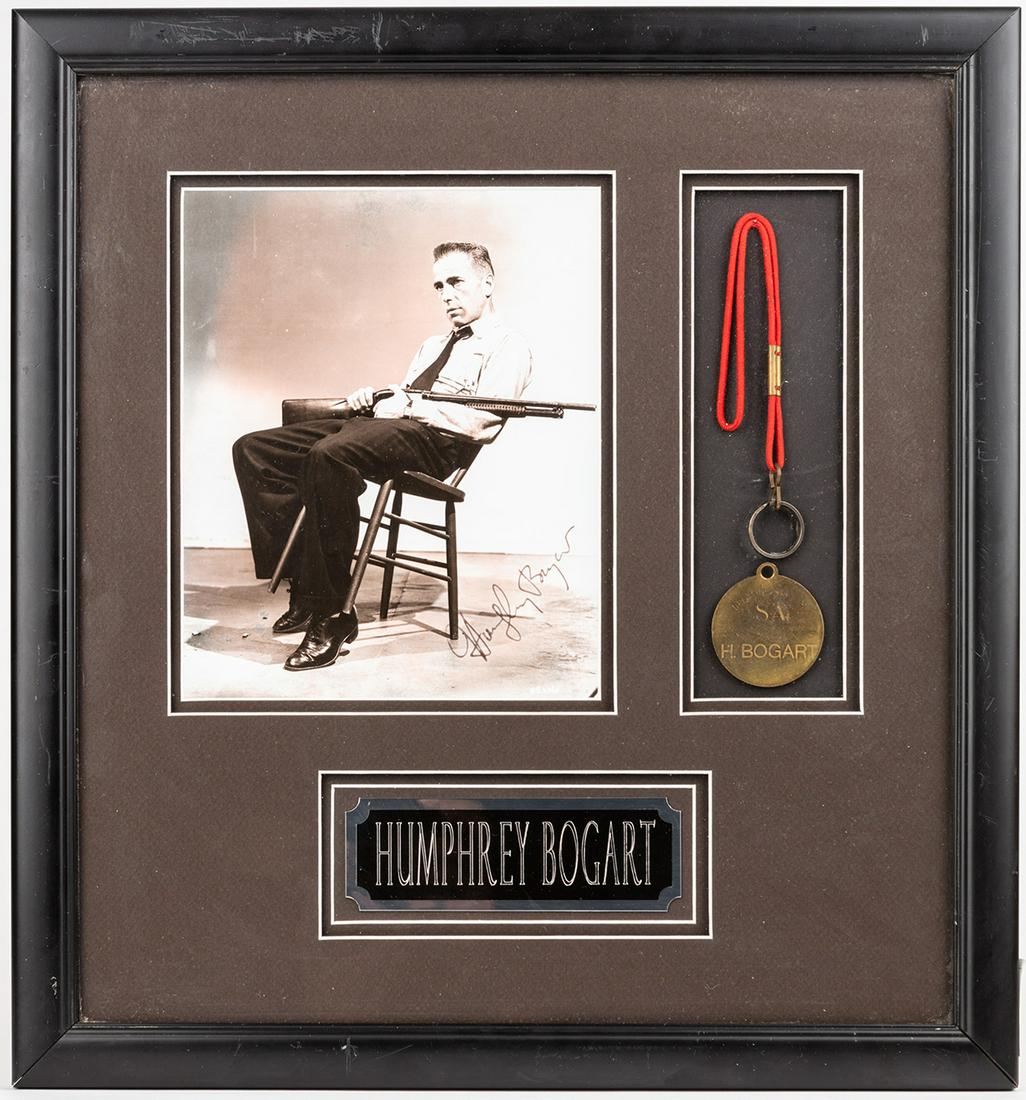 Humphrey Bogart: Personalized Dressing Room Key in: Humphrey Bogart: Personalized Dressing Room Key in Shadow Box Presentation. Humphrey Bogart (1899-1957) easily in the top five leading men during the Golden Age of Hollywood having starred in so many 