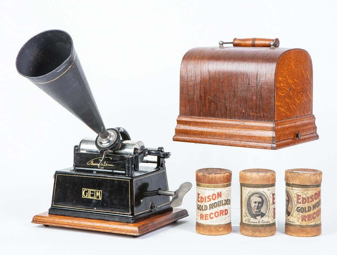 Extremely Clean Thomas Edison GEM Key Wind Player and: Extremely Clean Thomas Edison GEM Key Wind Player and Oak Case with Logo Clean and Visible. Working. Wonderful example of Thomas Edison's GEM phonograph, extremely clean condition and working save nec