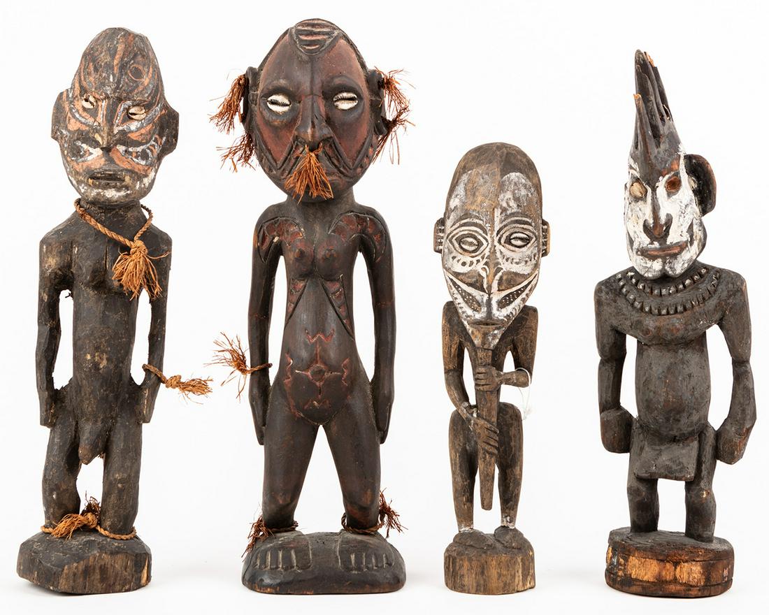 Four Striking Sepik River, Papua New Guinea Hand Carved: Four Striking Sepik River, Papua New Guinea Hand Carved Wood Spirit Sculptures With Shells, Raffia, Ocher and Other Organic Pigments. Four carved wood from the Sepik River region of Papua, New Guinea 