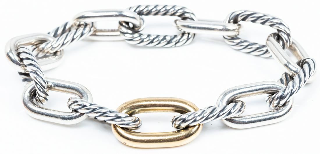 David Yurman, Popular Men's Heavy Link Sterling Silver: David Yurman, Popular Men's Heavy Link Sterling Silver Bracelet with Single 18K Gold Bonded on Sterling Oversized Link at Center. From the David Yurman "Madison" collection their men's sculpted classi