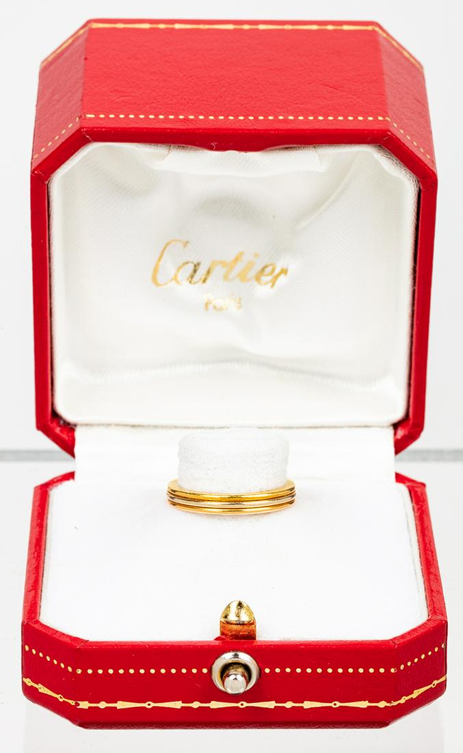 Ladies Cartier 18K Two Tone, Bevel Edge Wedding Band in: Ladies Cartier 18K Two Tone, Bevel Edge Wedding Band in Box. From Cartier, a vintage wedding band in two toned 18K yellow and white gold. Cartier size 48, on ring gauge, a size 4½. 3.42 grams. 