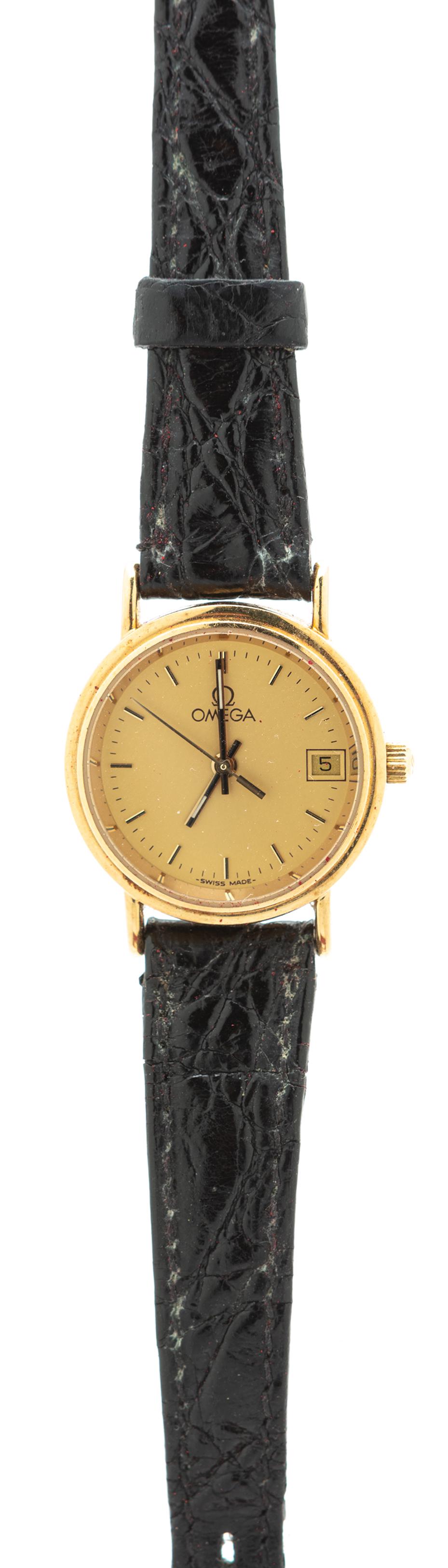 Lady's Omega 18K Yellow Gold Quartz Watch and Original: Lady's Omega 18K Yellow Gold Quartz Watch and Original Alligator Band. Vintage Lady's Omega 18K yellow gold quartz watch and original band. 21mm face and still has original paperwork. Watch is unteste