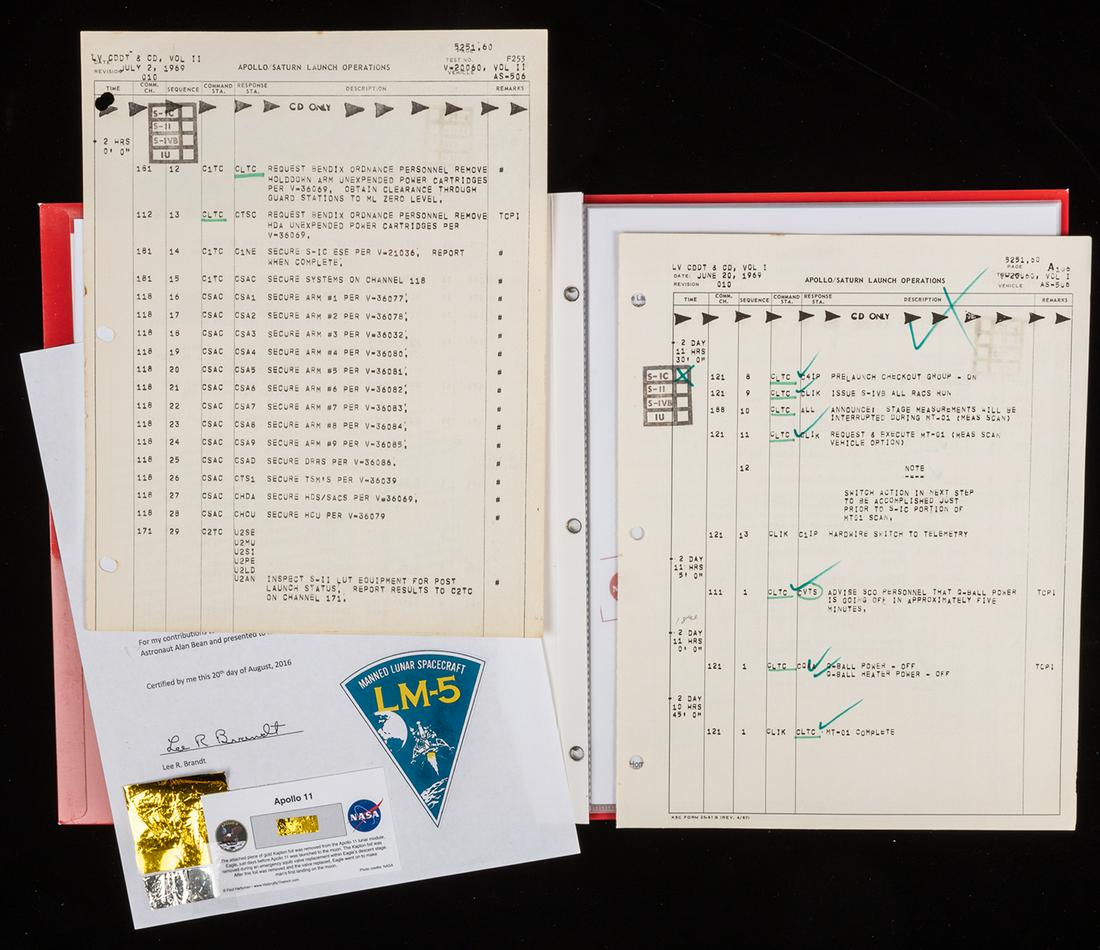 Apollo 11 Artifacts: Two Annotated Launch Countdown: Apollo 11 Artifacts: Two Annotated Launch Countdown Manual Pages Used by Norm Carlson plus Kapton Foil Removed From LM-5. Two unusual (non-flown) Apollo 11 artifacts. 1.) Two pages from the Launch Veh
