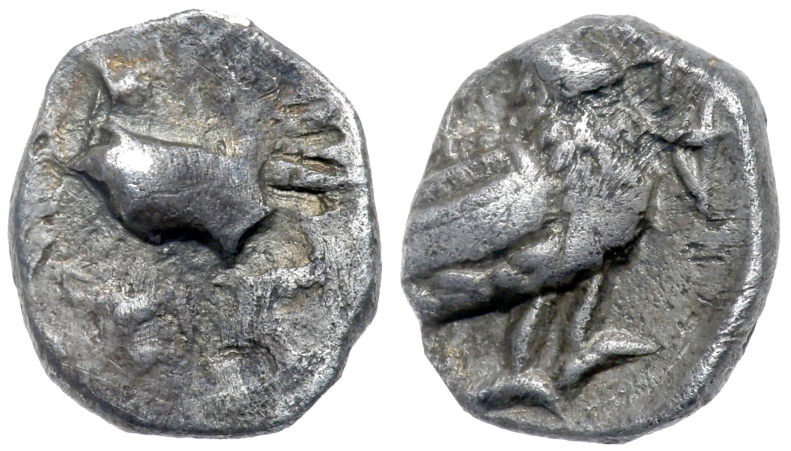 Judaea, Yehud (Judah). Hezekiah. Silver 1/2 Ma'ah Obol: Judaea, Yehud (Judah). Hezekiah. Silver 1/2 Ma'ah Obol (0.36 g), ca. 333/2-302/1 BCE. Head of chimaera right, degraded. Reverse: 'YHWDH (Yehud), duck standing right, head turned to look back. Hendin 1
