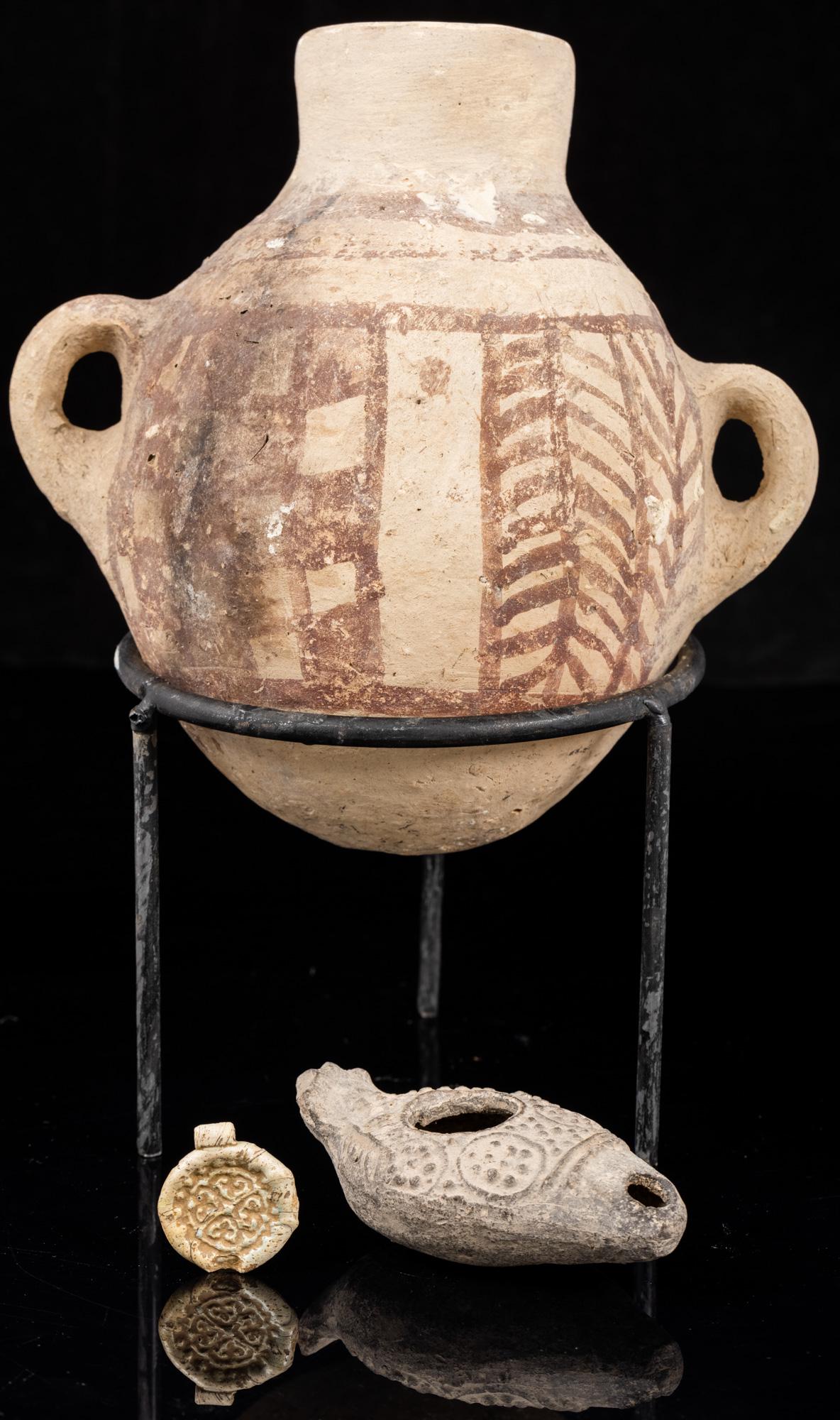 Ancient Judean. A Trio of Objects all found in Israel: Ancient Judean. A Trio of Objects all found in Israel. Consists of the following antiquities: Biblical Roman period (ca. 37 BC-70 AD) 2-handled terra cotta jar. Second Temple Period. Reddish brown geo