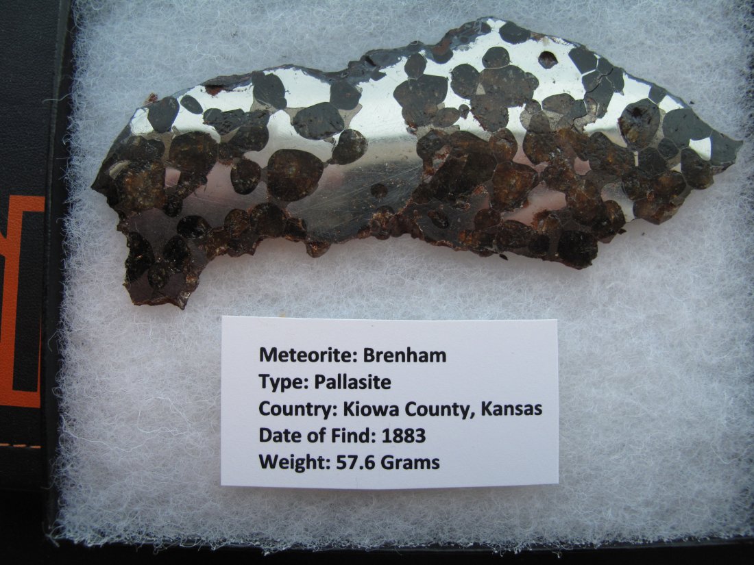Meteorite American 57.6 Gram Brenham Pallasite: Meteorite American 57.6 Gram Brenham Pallasite. The Brenham pallasite fell to earth some 1,000-2,000 years ago in Kiowa County near Haviland, Kansas. It is the most famous of all American pallasites a