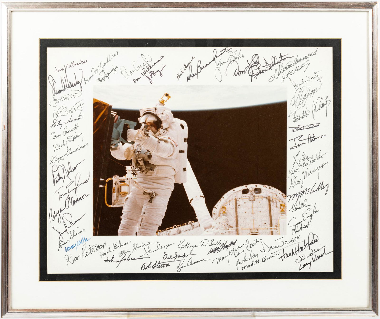 STS-41C Framed EVA Photo Signed on Mat By 56 Astronauts (1 of 1)