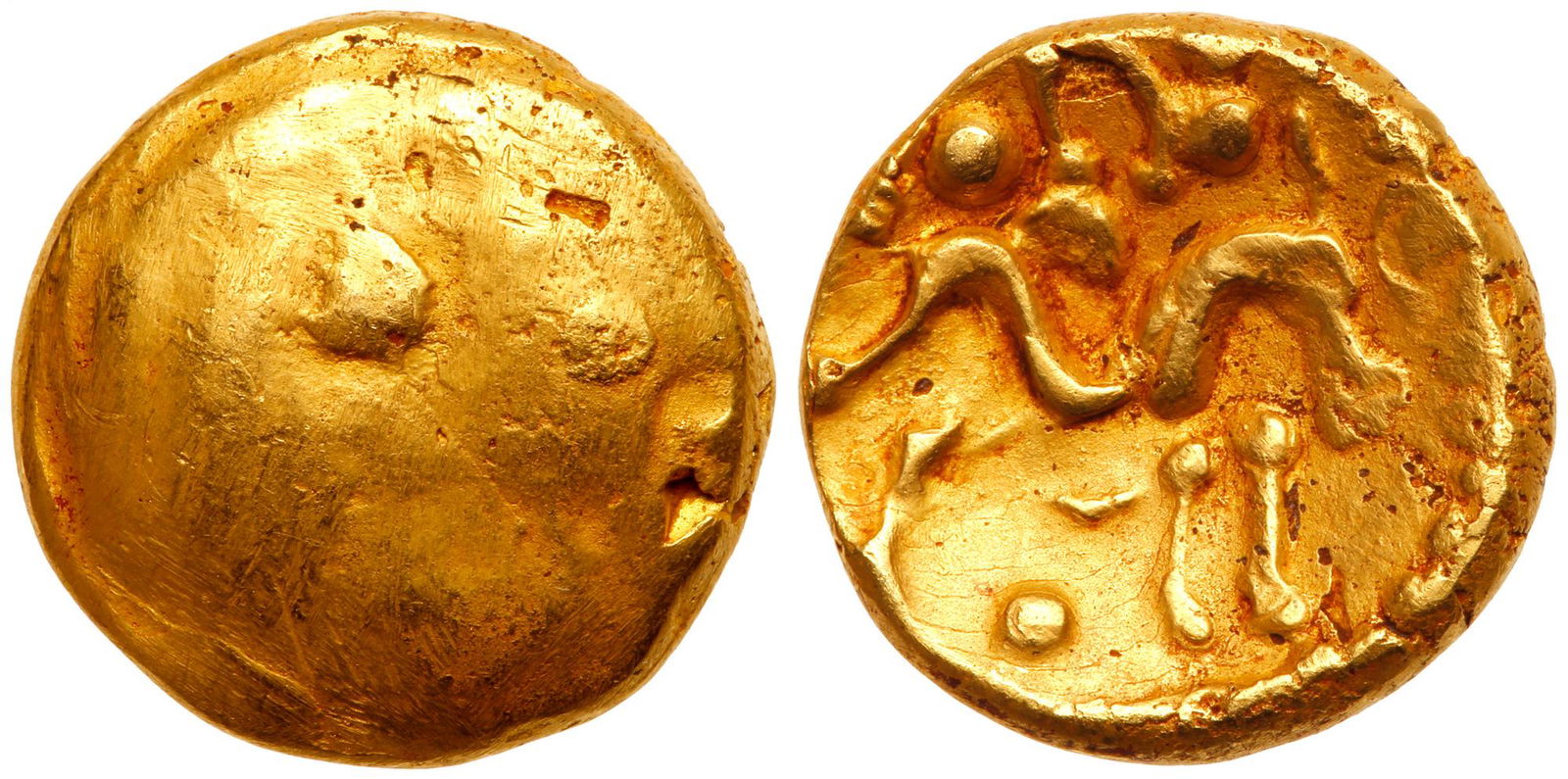 Celtic. Gallic War Issues, c. 60-50 BC. Gold Stater: Celtic. Gallic War Issues, c. 60-50 BC. Gold Stater (8.21 g). Obverse Uniface. Reverse: Dis-jointed horse to right; pellet below. Spink 11; ABC 16. A touch of rose color toning adds to its appeal. Ver