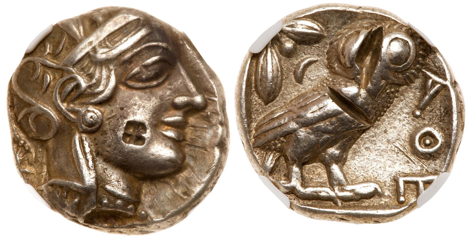 Attica. Athens. Silver Tetradrachm (17.12g), ca.: Attica. Athens. Silver Tetradrachm (17.12g), ca. 440-404 BC. Helmeted head of Athena right, frontal eye; small incuse square countermark on cheek. Reverse: AΘE, owl standing right, head facing; 