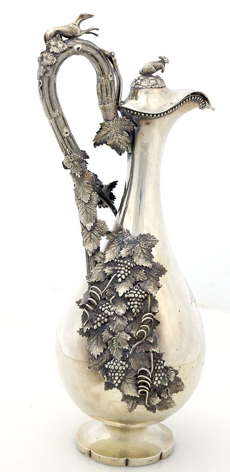 20th Century European Sterling Silver Presentation: 20th Century European Sterling Silver Presentation Pitcher (Possibly South African). Adorned with applied grapes and leaves, surmounted by a greyhound and a hare. Inscribed on the front: "Pres