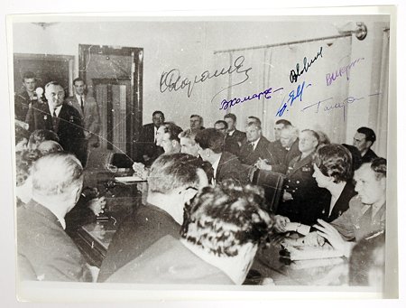 Soviet Program, c1963, Gagarin, Tereshkova, Komaro: Soviet Program, c1963, Gagarin, Tereshkova, Komarov, Yegerov, Feoktistov and Korolev Autographs. Signed in various color inks on a black and white reprint photo (9.5x7") of them sitting in