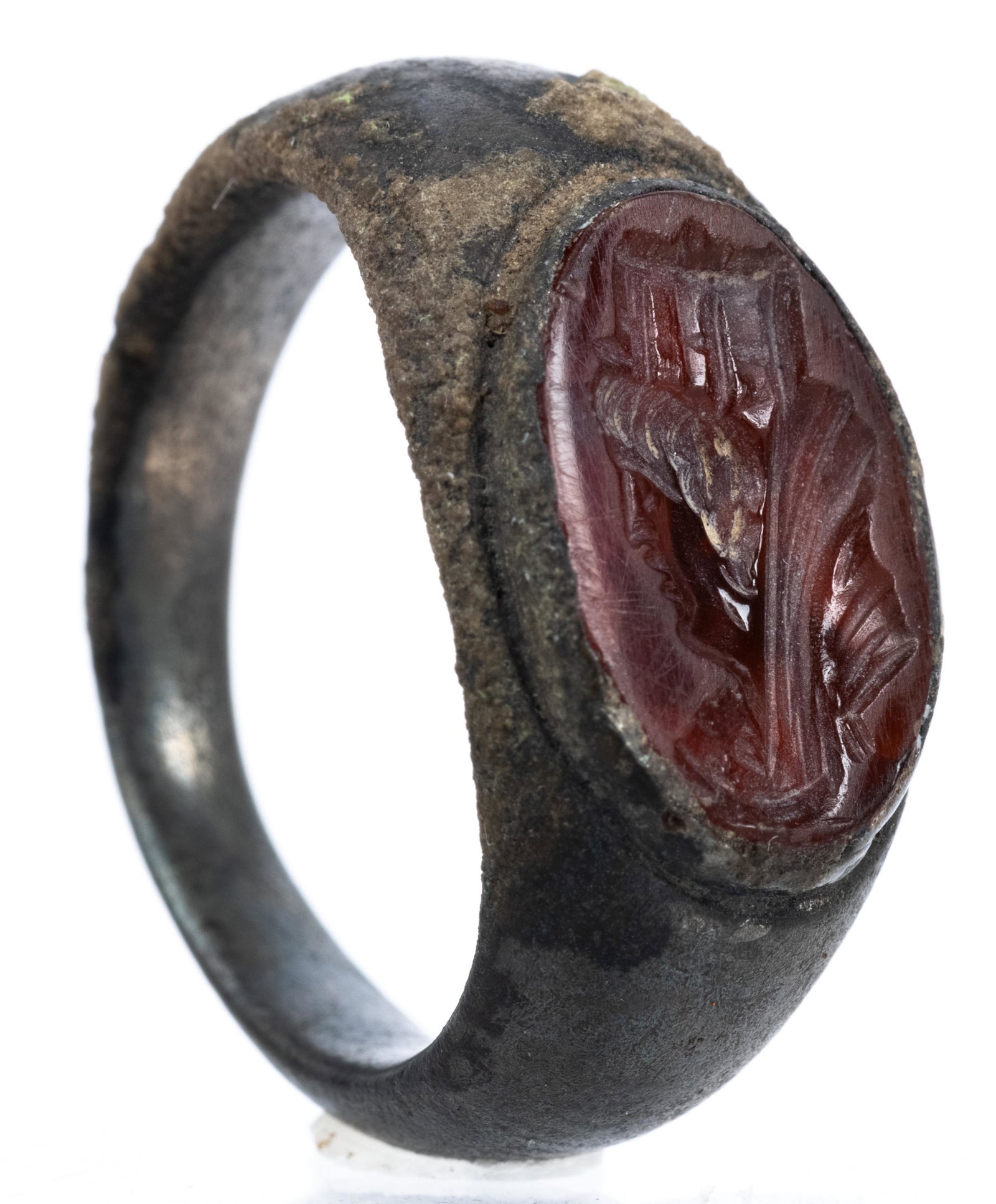 Roman 4th Century A.D. Bronze Ring with Deeply Carved: Roman 4th Century A.D. Bronze Ring with Deeply Carved Carnelian Intaglio Portrait of a Regal Woman. 4th century A.D. Roman bronze ring centered with an oval intaglio deeply carved with the left facing