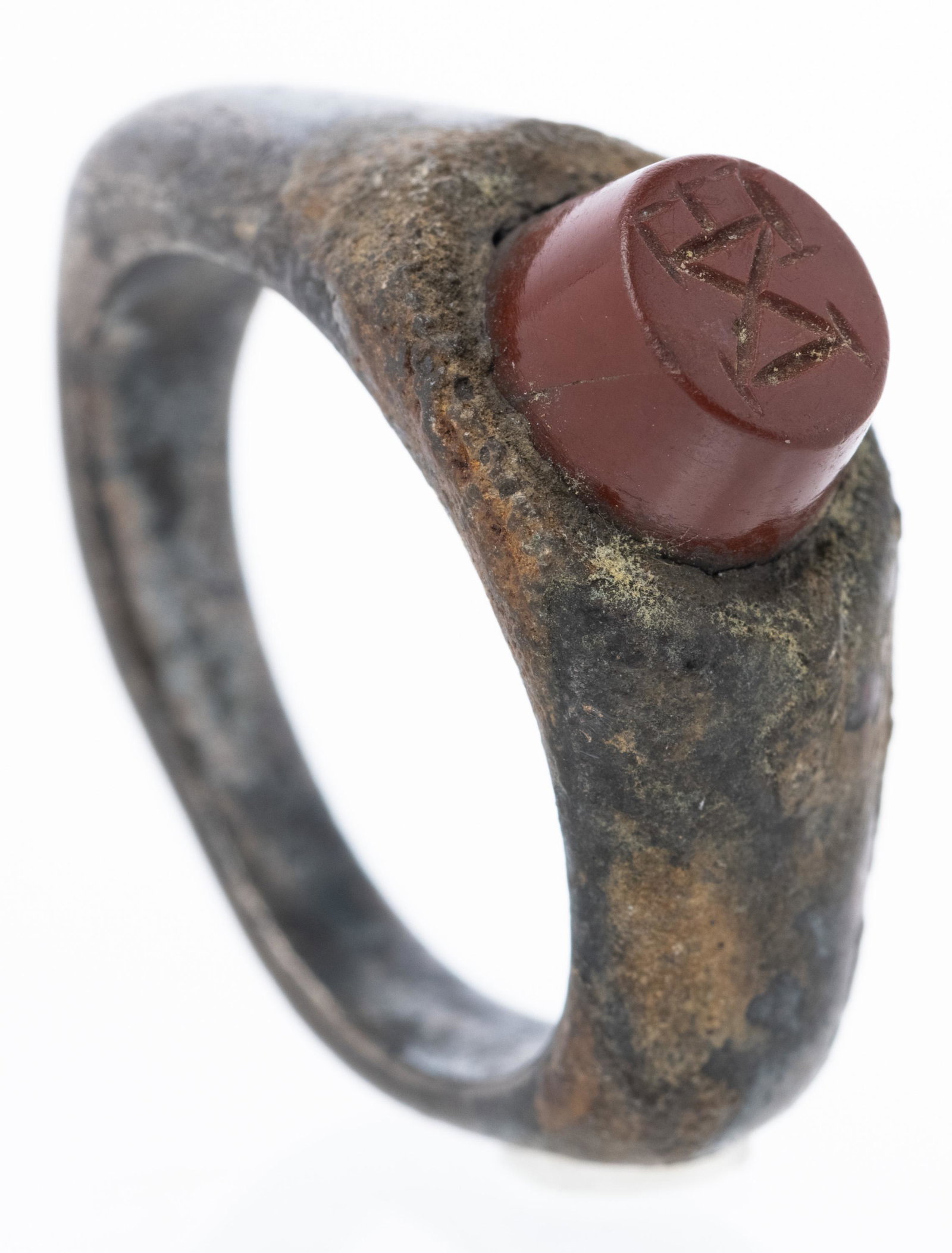 Roman 4th Century A.D. Bronze Ring with Raised: Roman 4th Century A.D. Bronze Ring with Raised Carnelian Etched with Letters IXE. Roman 4th century A.D. bronze ring with raised carnelian etched with monogram (IXE). 10.35 grams and a size 4. Estimat