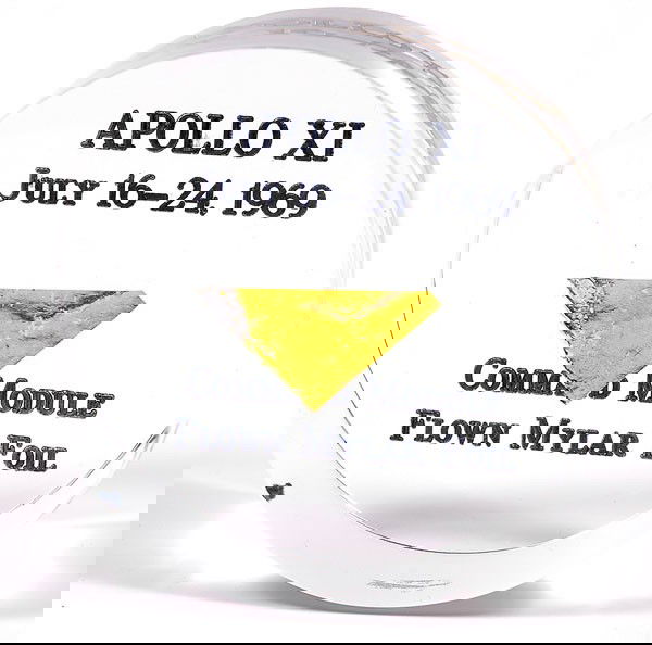 Apollo 11, 1969, FLOWN Gold Foil: Apollo 11, 1969, FLOWN Gold Foil (.75x.75") mounted in a clear lucite cylinder (2.5x1") that is inscribed: "Apollo XI / July 16-24, 1969 / Command Module / Flown Mylar Foil