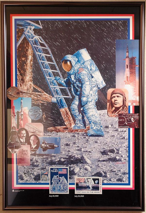 Apollo 11, 1969, Neil Armstrong Autograph: Apollo 11, 1969, Neil Armstrong Autograph. On the bottom of a large, 1989, multicolor Postal Service poster (framed to 25x37") of a Chris Calle painting showing Neil Armstrong stepping ont