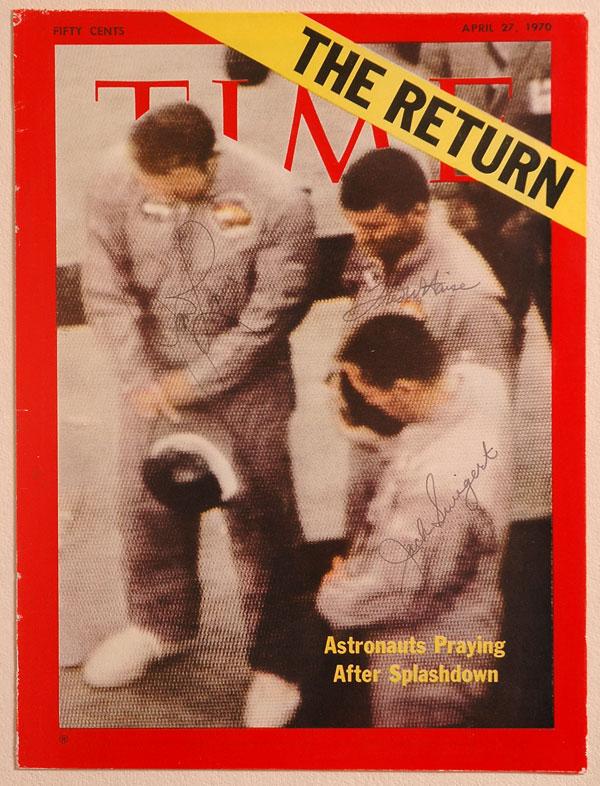 Apollo 13, 1970, James Lovell, Jack Swigert and Fr: Apollo 13, 1970, James Lovell, Jack Swigert and Fred Haise Vintage Autographs. On the cover of the April 27, 1970 issue of Time magazine showing them praying after splashdown. Boldly signed and framed