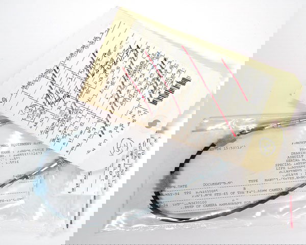 STS-65, 1994, FLOWN Nikon 35mm. Camera Cable Relea: STS-65, 1994, FLOWN "Nikon 35mm. Camera Cable Release" (12") This cable release is sealed in an original clear plastic parts bag dated 25 Aug 2006. There is a NASA inventory label