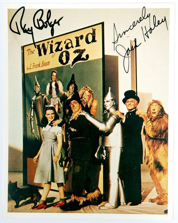 Bolger, Ray and Jack Haley: Bolger, Ray and Jack Haley. Color 10 x 8 in. Photo Signed "Ray Bolger" and "Sincerely Jack Haley." Bolger, who played the Scarecrow and Haley, who played the Tin Man in the very popula
