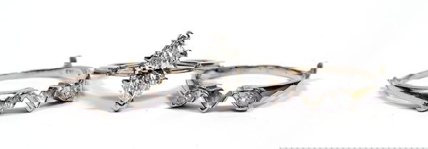 Lady's Diamond, 14K White Gold Wedding Ring Set: Lady's Diamond, 14K White Gold Wedding Ring Set. The center wedding ring featuring one marquise-cut diamonds, weighing approximately 1.50 carats, VS in Clarity, I to J in Color, having a medium to