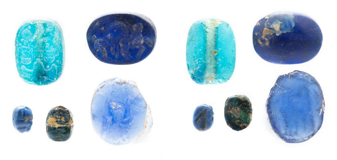 Collection of 5 Different Egyptian and Phoenician Glass Scarabs ca. 5th-4th Century B.C.: Collection of 5 Different Egyptian and Phoenician Glass Scarabs ca. 5th-4th Century B.C. Collection of scarce Egyptian and Phoenician glass scarabs all having some iridescence. Sizes range from 7mm to
