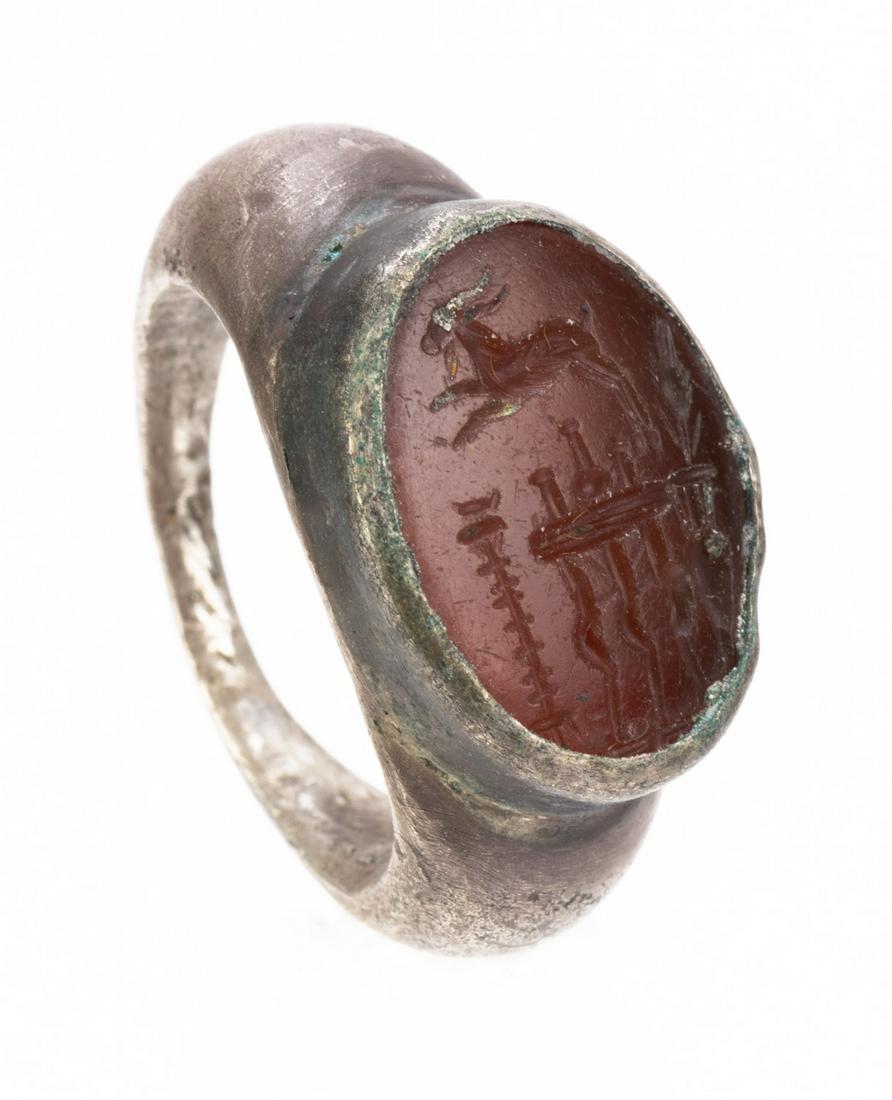 Large 2nd A.D. Roman Silver Ring with a Large Carnelian Intaglio with Considerable Carving Including (1 of 1)