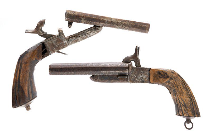 Pair of Belgian Side by Side Double Barrel Pin Fire Pocket Pistols with Drop Triggers ca. 1880s: Pair of Belgian Side by Side Double Barrel Pin Fire Pocket Pistols with Drop Triggers ca. 1880s. A pair of pocket pistols from the 1880s approximately .58 caliber, with engraved box lock, folding trig