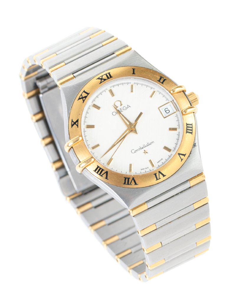 Men's Vintage Omega Constellation in Stainless Steel with an 18K Yellow Gold Fixed Bezel, Excellent: Men's Vintage Omega Constellation in Stainless Steel with an 18K Yellow Gold Fixed Bezel, Excellent Pre-Owned Condition. Very fine vintage quartz Omega Constellation model 396.1201, Omega 1532 movemen