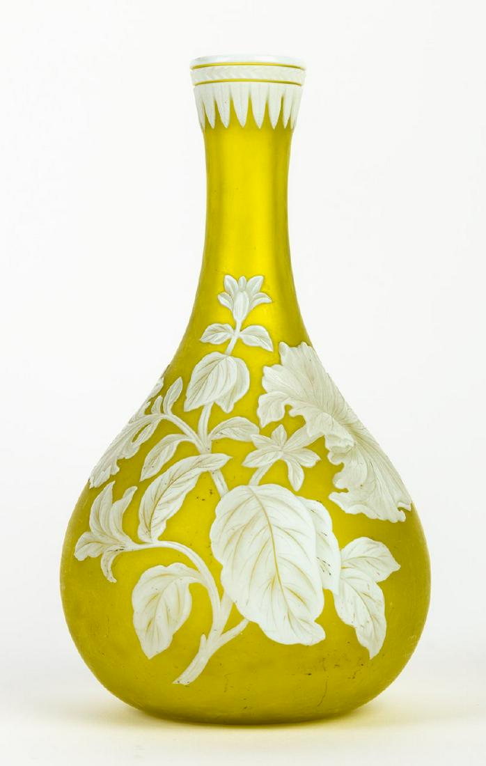 Thomas Webb Cameo Art Glass Vase White on Citron Green Colored Glass: Thomas Webb Cameo Art Glass Vase White on Citron Green Colored Glass. Vase features graceful flowers and leaves in various stages of bloom. The finely carved details wraps around 60% of the body with