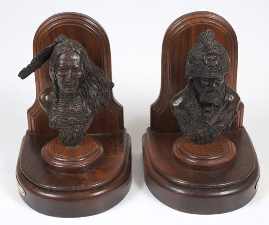 Western Bookends by Gerry Metz: Western Bookends by Gerry Metz. Each bookend consists of a bronze sculptured bust of an early American West figure. The trapper is 7" high and the warrior is 6½" high. Each is set in a 