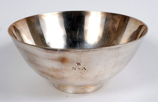 Tiffany and Company Sterling Bowl: Tiffany and Company Sterling Bowl. A silver bowl from Tiffany and Co produced as a reproduction of an original made by Joseph Conyers around 1700. The diameter of this piece measures 9" and its he