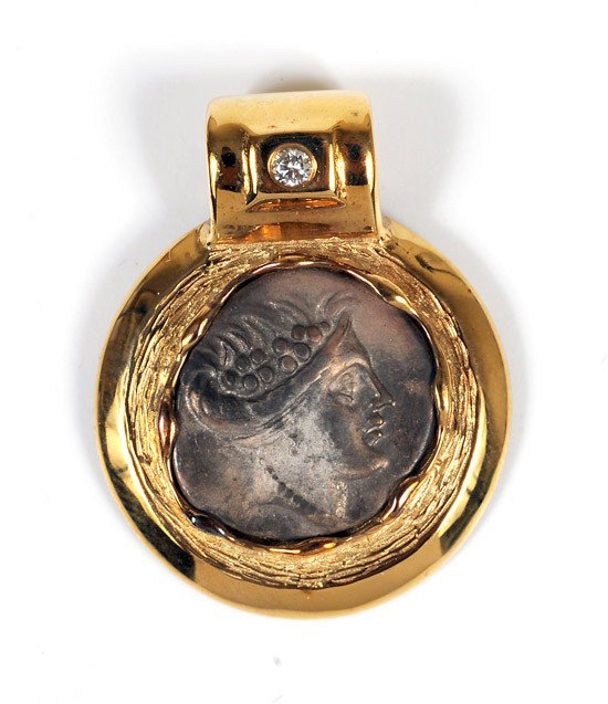 Ancient Greek Silver Hemidrachm In Gold Jeweler's : Ancient Greek Silver Hemidrachm In Gold Jeweler's Mounting. Minted in Histaia Circa 300 B.C. Mounted on an individually designed 14K gold setting and placed in a leatherette portfolio with the Cer