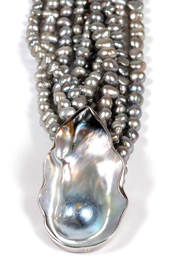 Grey Mother of Pearl, Fresh Water Pearl, Sterling : Grey Mother of Pearl, Fresh Water Pearl, Sterling Silver Necklace. Featuring a large grey mother of pearl pendant, set in a sterling silver frame, hanging from a multi strand grey pearl bead necklace,