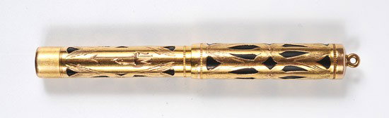Waterman 14K Yellow Gold Case Fountain Pen: Waterman 14K Yellow Gold Case Fountain Pen. Marked 552 1/2 V on the bottom, the gold cover is a floral design. Estimated Value $200 - 300.