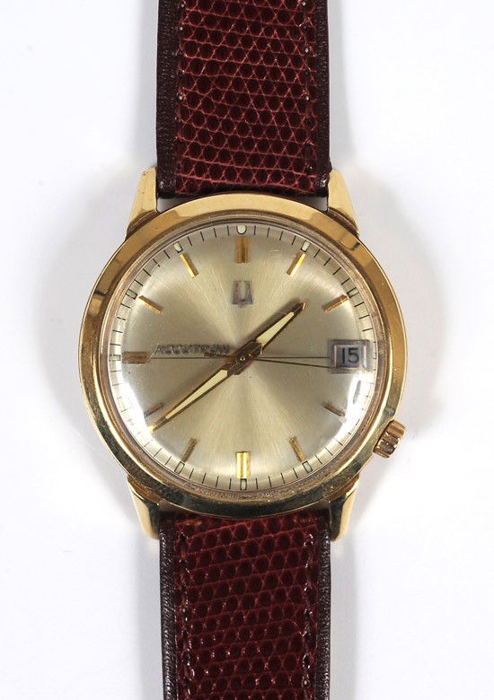Gent's Bulova Accutron, 14K Yellow Gold Wristwatch: Gent's Bulova Accutron, 14K Yellow Gold Wristwatch. Having a round case C23913/M7, round beige dial, gold stick markers, date window, gold illuminating hands, sweep seconds hand, completed by a br
