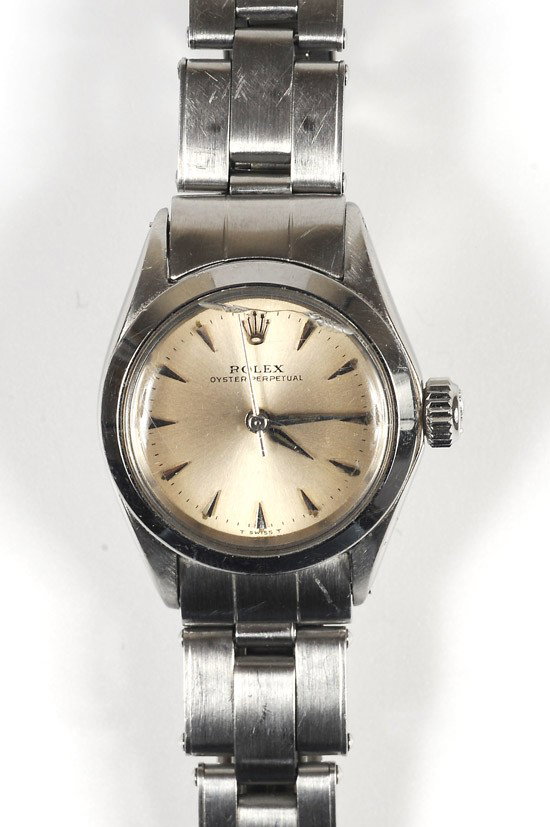 Lady's Rolex Oyster Perpetual, Stainless Steel Wri: Lady's Rolex Oyster Perpetual, Stainless Steel Wristwatch. Having a silver dial, abstract markers, sweep seconds hand, silver hands, plastic crystal, smooth bezel, completed by a stainless steel o
