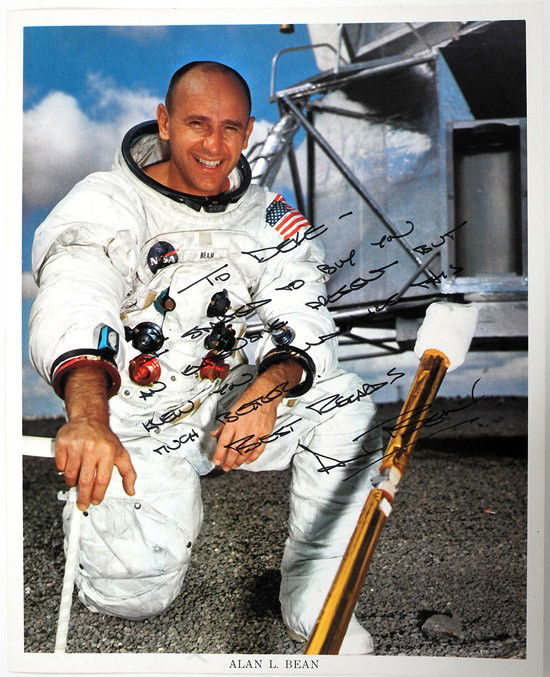 Apollo 12, 1969, Alan Bean Autograph: Apollo 12, 1969, Alan Bean Autograph. On a NASA 8x10" color lithograph of him in his white space suit. He has inscribed the piece: "To Deke - I started to buy you an expensive present but knew
