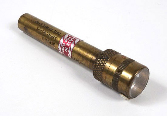 Apollo Program, C1965, Brass Training Flashlight: Apollo Program, C1965, Brass "Training" Flashlight (5x1") that is identical to another flashlight in this sale. This one, used in training, has a "Class III / Not for Flight