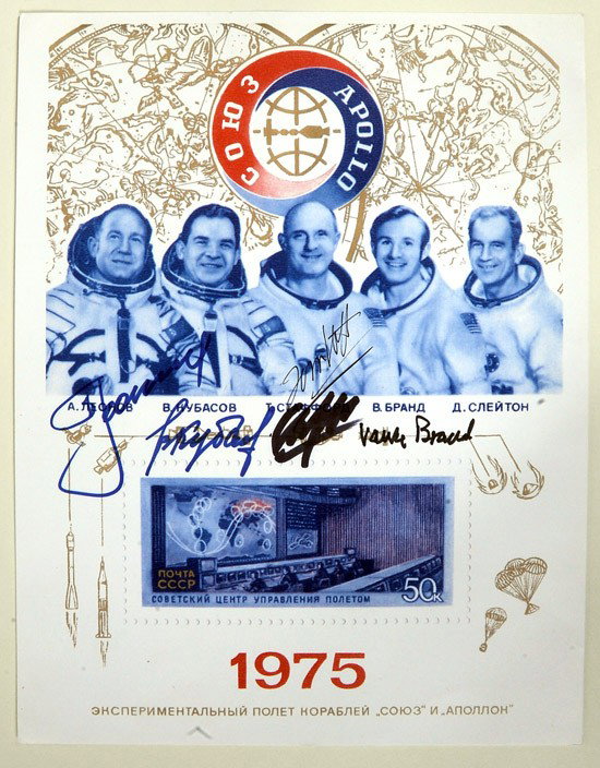 ASTP, 1975, Stafford, Brand, Slayton, Leonov & Ku: ASTP, 1975, Stafford, Brand, Slayton, Leonov & Kubasov Autographs. On an unusual Russian card (8.5x11") showing the crew and Russian Mission Control. Unusual. Estimated Value $250 - 35
