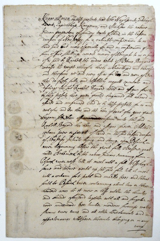 [Passaic, New Jersey] 1709 Land Grant Signed by Fo: [Passaic, New Jersey] 1709 Land Grant Signed by Four Native Americans. An early land grant encompassing a major portion of Passaic, New Jersey signed by four Native Americans with their totem signatur