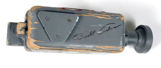 Apollo 8, 1968, Command Module TV Camera Proto: Apollo 8, 1968, Command Module "TV Camera" Prototype (1.5x7.3") This gray-painted wooden prototype of a handheld TV camera has red "RCA" decals on both sides and, in additi