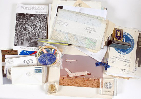 Miscellaneous, 1960s//80s, Deke Slayton's Collecti: Miscellaneous, 1960s//80s, Deke Slayton's Collection Balance. A partial carton filled with a diverse assortment of memorabilia including jewelry, lucite and other awards, a marble pen/pencil desk 