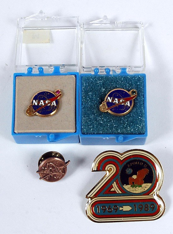 Miscellaneous, NASA Employee Lapel Pins: Miscellaneous, NASA Employee Lapel Pins. Lot of four different pins including the 5 and 10 year pins (bronze and silver colored) and the 20 year and 30 year pins (both enameled and jewelle