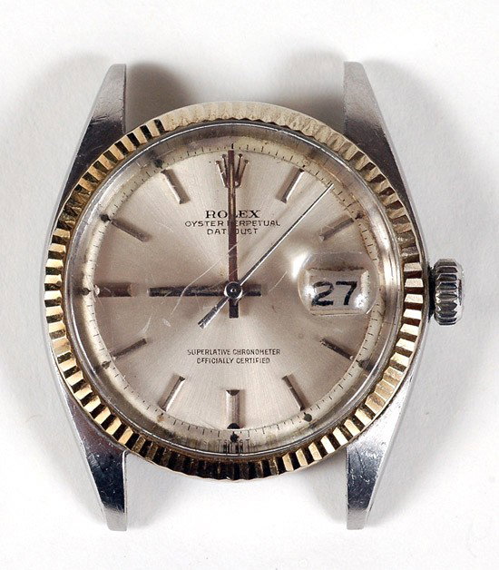 Rolex Oyster Perpetual Date Just 14K Yellow Gold &: Rolex Oyster Perpetual Date Just 14K Yellow Gold & Stainless Steel Wristwatch. Having a silver dial, gold hands, gold stick markers, fluted 14k yellow gold bezel, model #1601, serial #3159058, head on