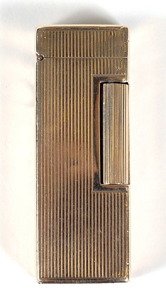 Dunhill 14K Yellow Gold Case Lighter: Dunhill 14K Yellow Gold Case Lighter. Having a 14k yellow gold outer jacket signed Dunhill. Note: lighter is in working condition. Estimated Value $200 - 300.