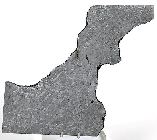 Meteorite Etched Gibeon Slice: Meteorite Etched Gibeon Slice. Gibeon iron-nickel meteorites are in very high demand as they are only available when collections are sold and possess the most beautiful internal crystalline structure