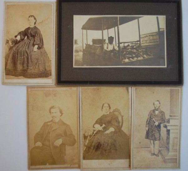 5 19th/Early 20th. c. Photographs: Photo of African American man tending a horse driven produce wagon. Sign in picture reads Central Market....Fancy Groceries...Meats & Provisions". Cart appears to be full of corn and potatoes. 4 New E